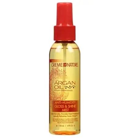 The Creme of Nature Anti-Humidity Gloss & Shine Mist is the perfect solution for taming frizz and maintaining a sleek, glossy finish all day long. Formulated with natural ingredients like Argan Oil, this mist effectively prevents moisture from ruining your styled hair, so you can say goodbye to unruly strands. Lightweight and easily absorbed into hair strands, this product provides added shine without weighing hair down. Simply apply to dry hair as needed for a flawless, polished look. Give your hair the nourishment it deserves with the Creme of Nature Anti-Humidity Gloss & Shine Mist.