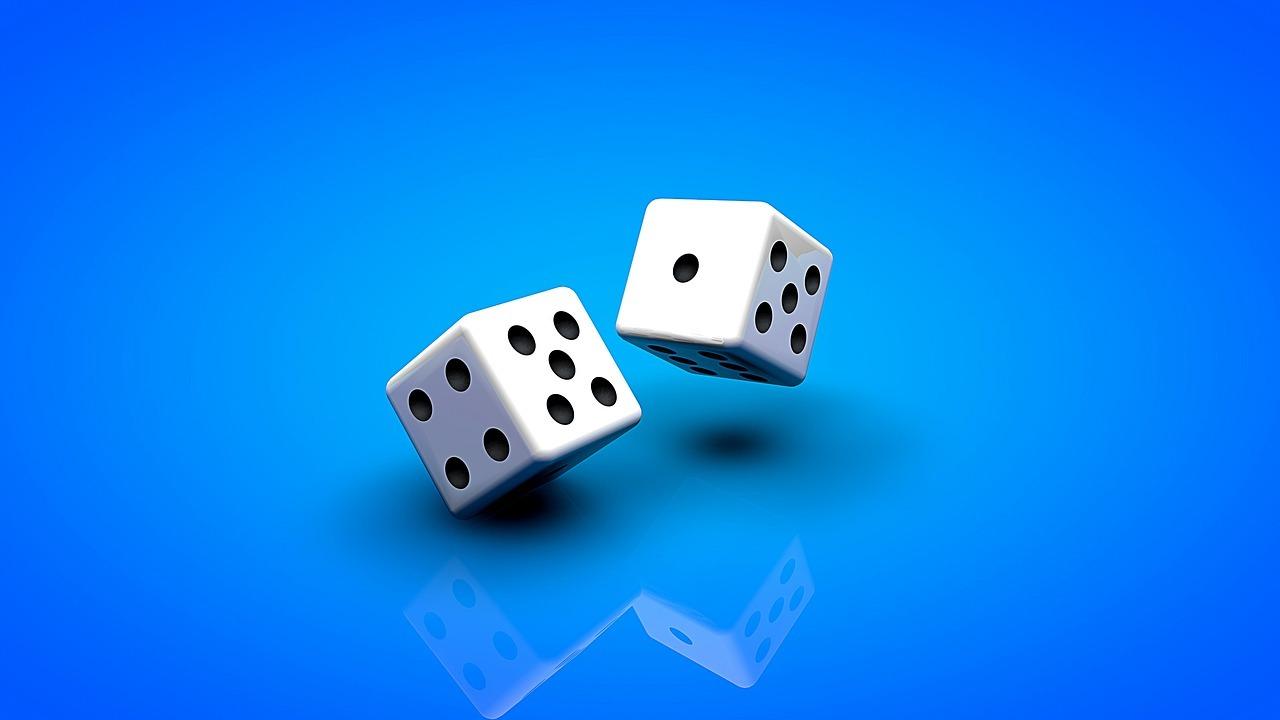 FreshBet Casino chips stacked on polished wooden table close-up